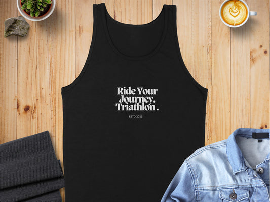 Ride Your Journey Triathlon 2025 tank top, black, 100% cotton, unisex sizing, flat lay with accessories.