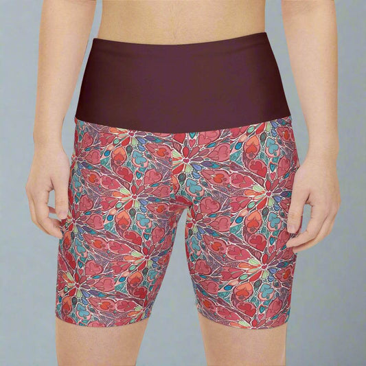 Floral workout shorts for women with vibrant colors, ideal for yoga and fitness.