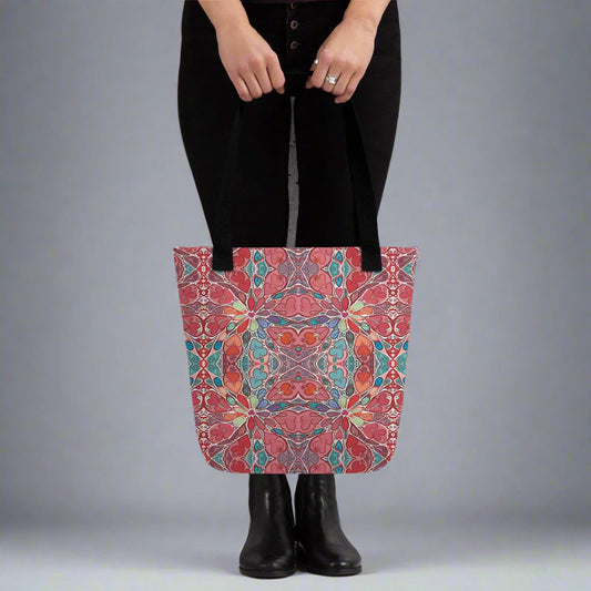 Boho Mandala Tote Bag with colorful heart-inspired art print being held, stylish and reusable for shopping or daily use.