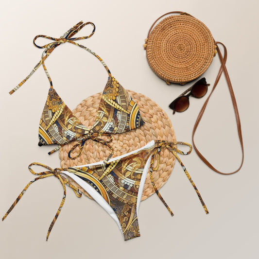 Gold Art Deco Print String Bikini Set with intricate vintage-inspired pattern, adjustable ties, and UPF 50+ protection.