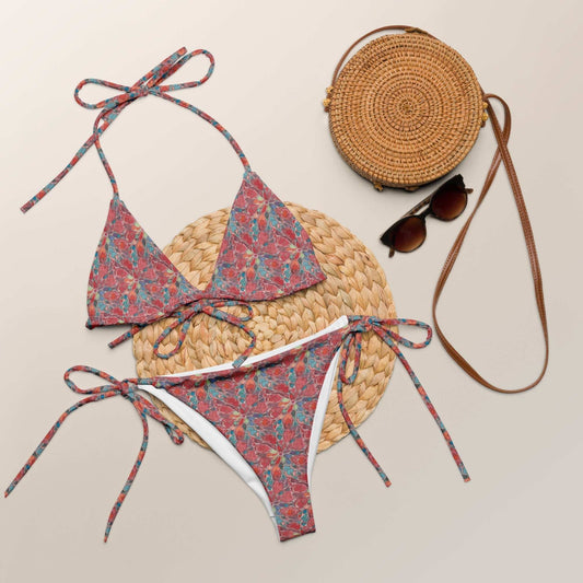 Boho abstract print string bikini set with halter ties and side-tie bottoms, featuring a vibrant multicolor pattern, UPF 50+ sun protection, and customizable fit.