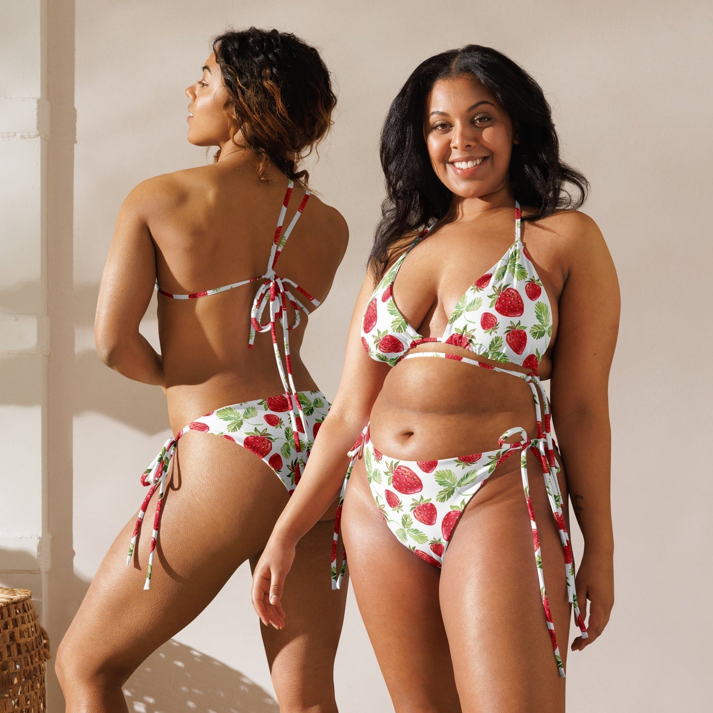 Strawberry pattern recycled string bikini with adjustable straps.