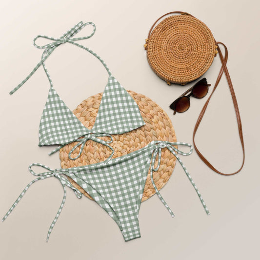 Green plaid gingham check string bikini set with halter top and side-tie bottoms, featuring UPF 50+ protection.