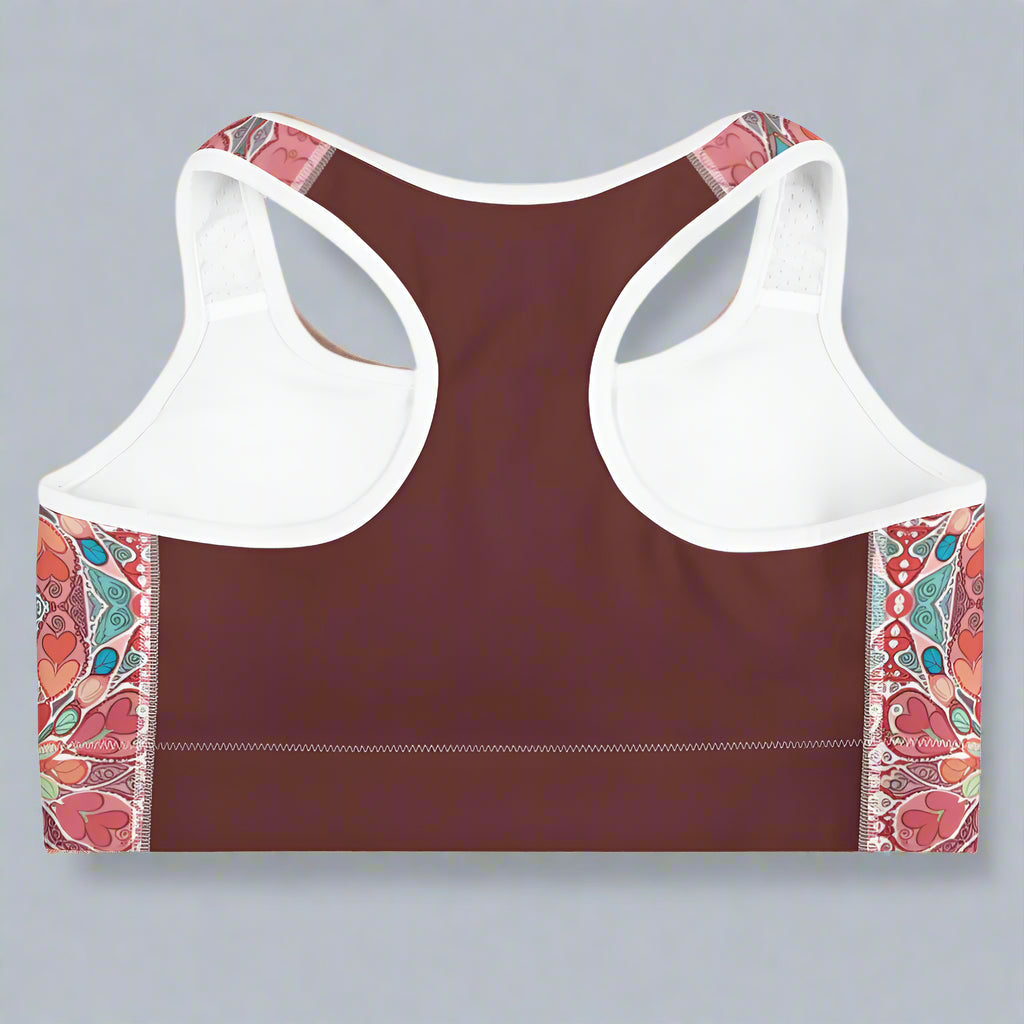 Yoga Sports bra with colorful patterned sides, racerback design, and wide elastic band for support.