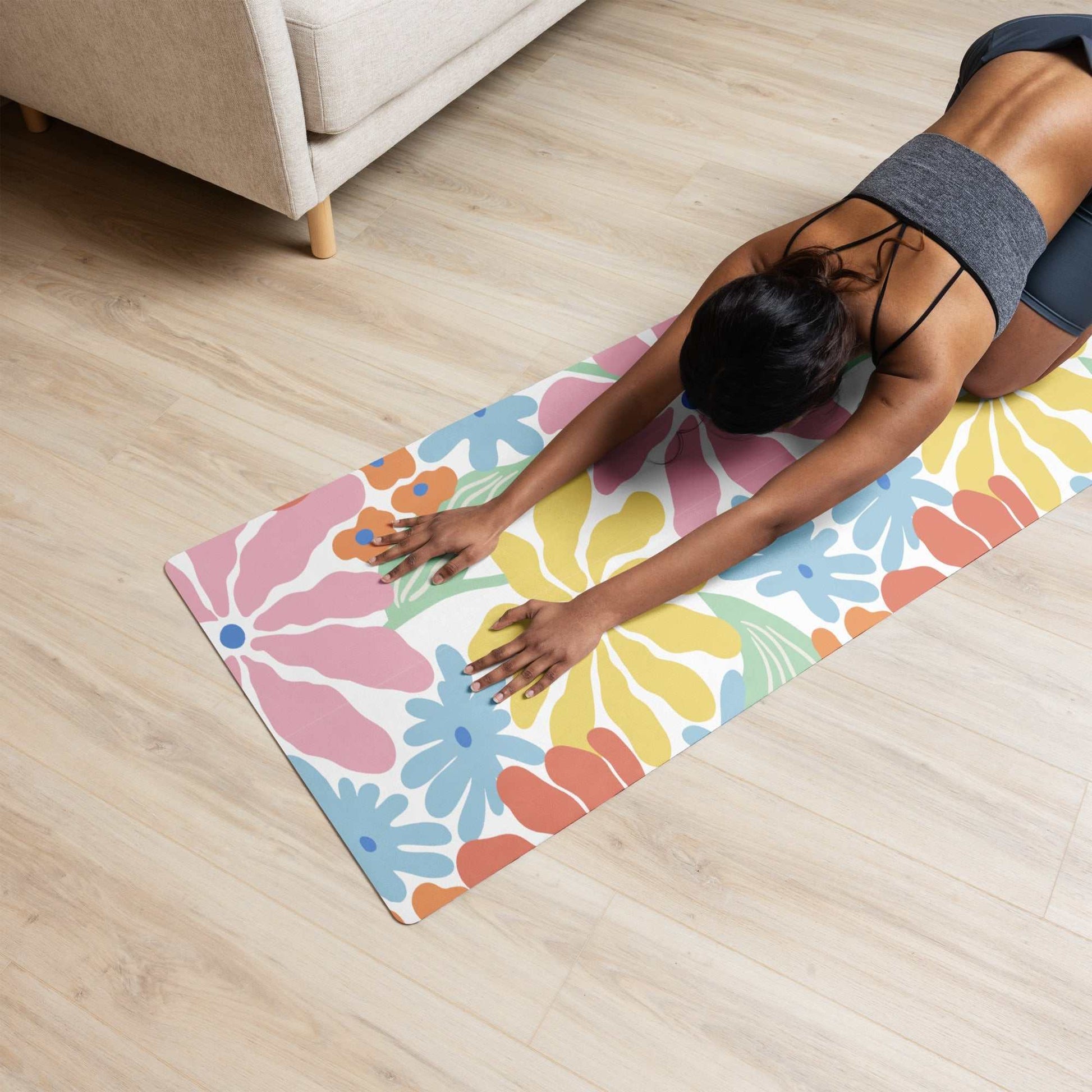Colorful yoga mat with anti-slip rubber bottom and soft microsuede top, ideal for exercise and meditation.