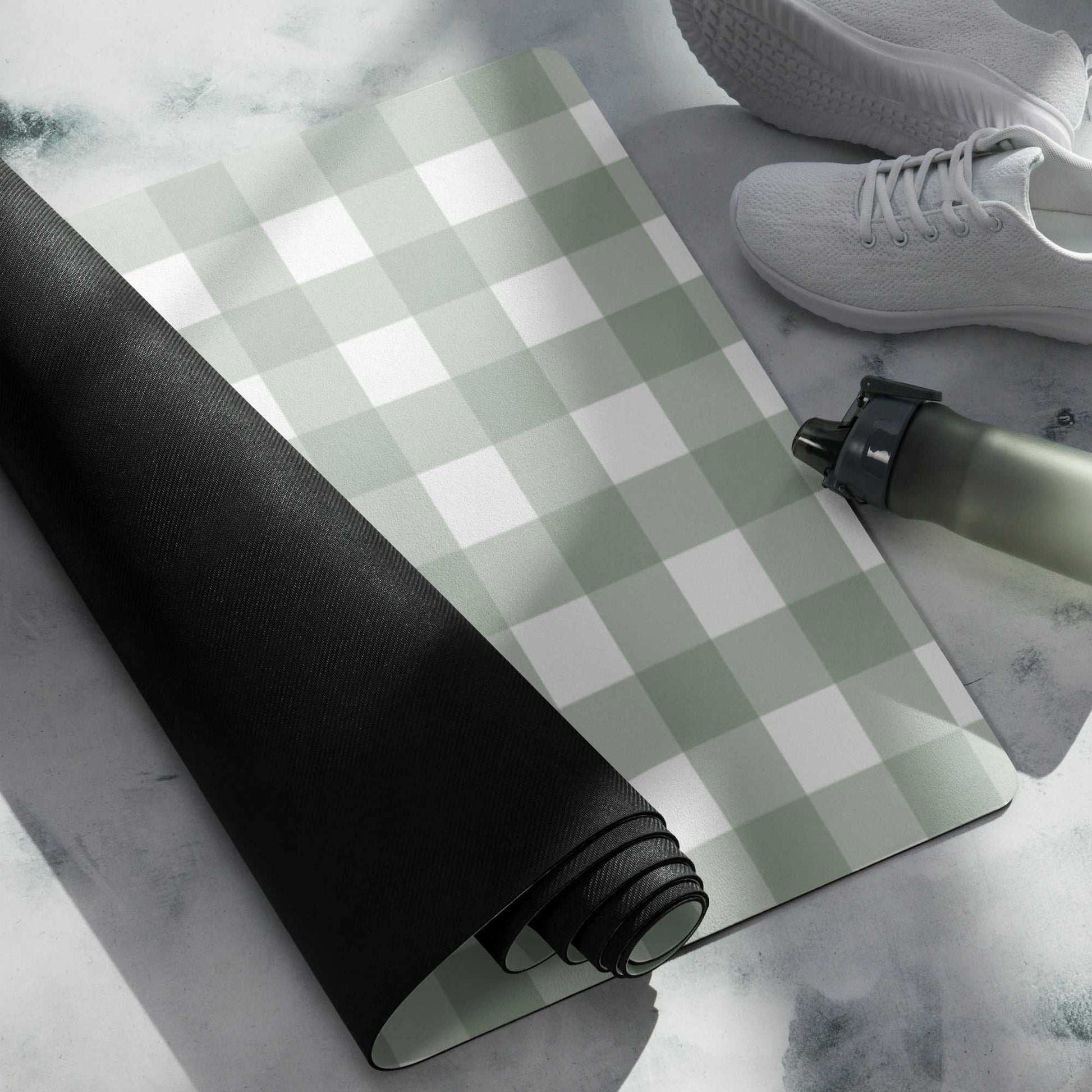 Yoga mat with checkered design, anti-slip rubber base, and soft microsuede top, ideal for exercise and meditation.
