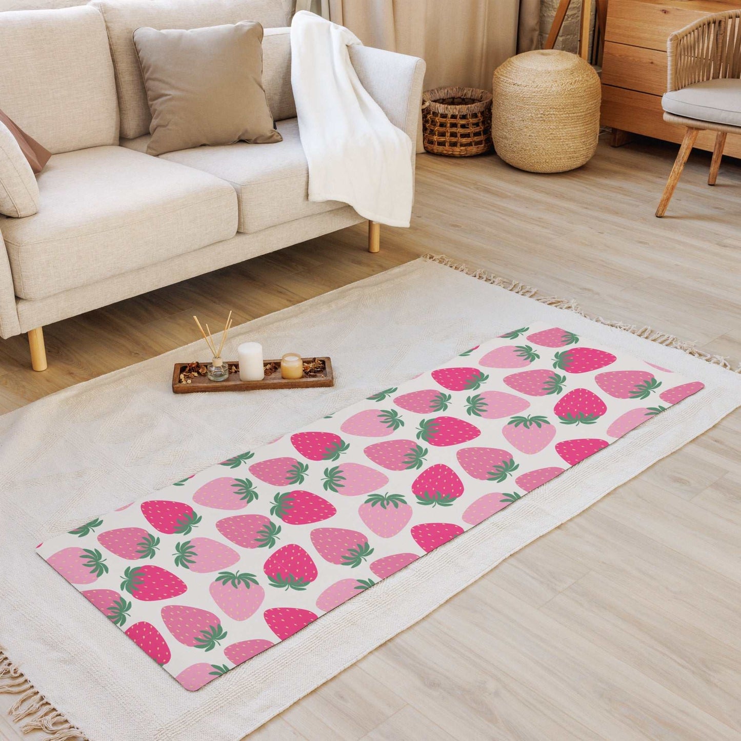 Yoga mat with strawberry design, anti-slip rubber bottom, microsuede top, size 24″ × 68″, in a cozy living room.
