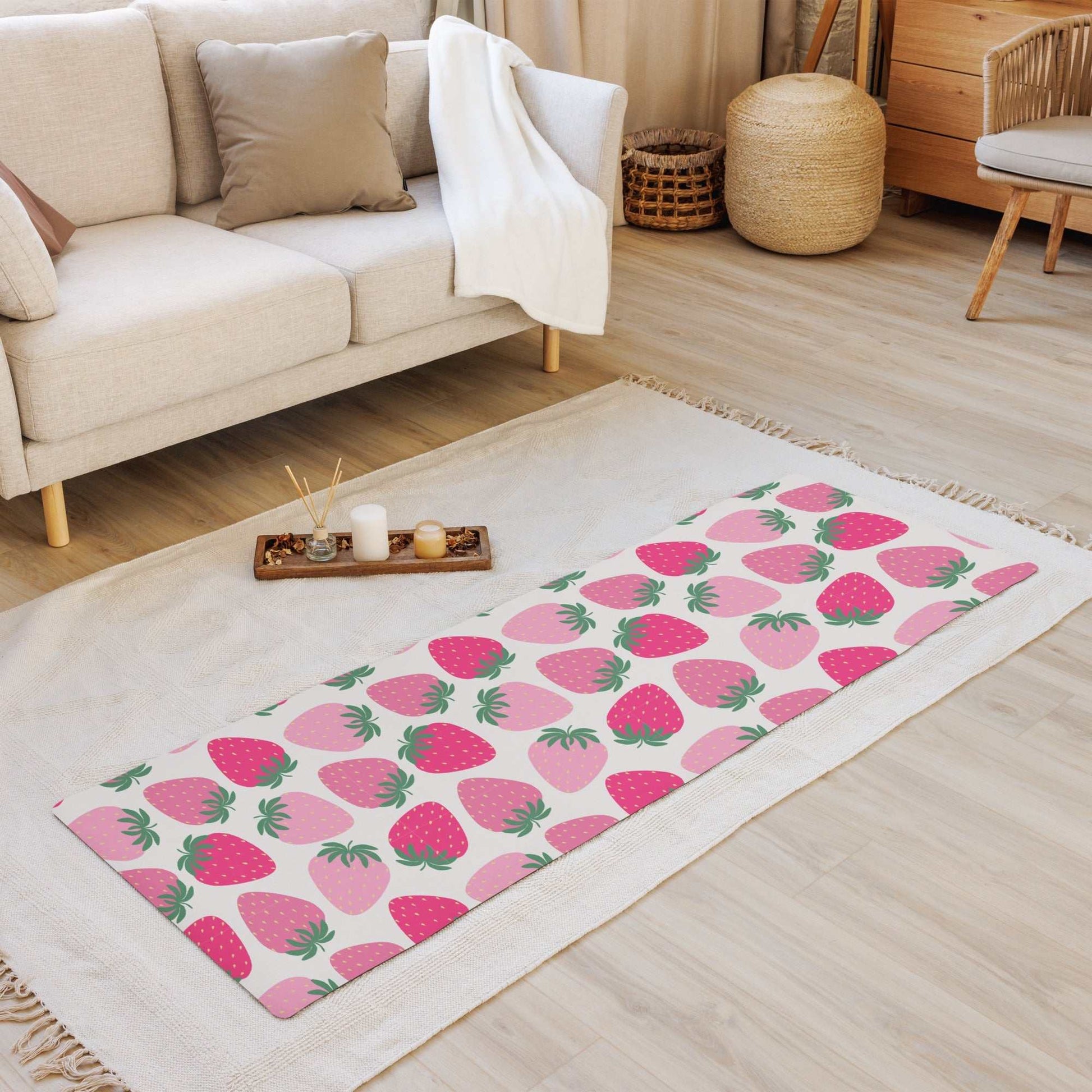 Yoga mat with strawberry design, anti-slip rubber bottom, microsuede top, size 24″ × 68″, in a cozy living room.